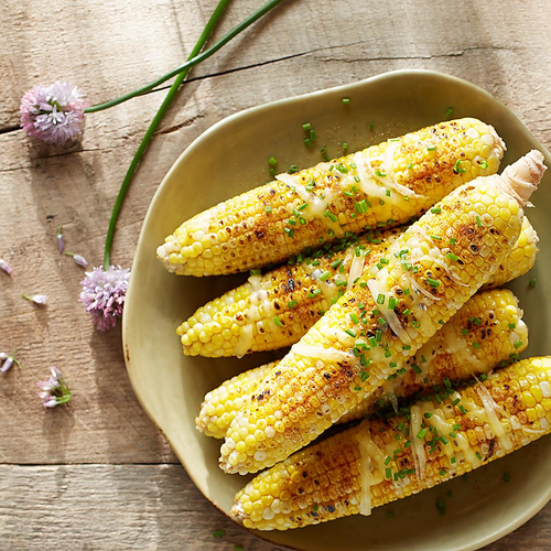 Grilled Cheesy Cajun Corn